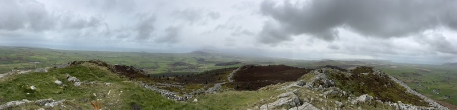 Panoramic view from the mountain summit — Llyn Peninsula stretching to the horizon